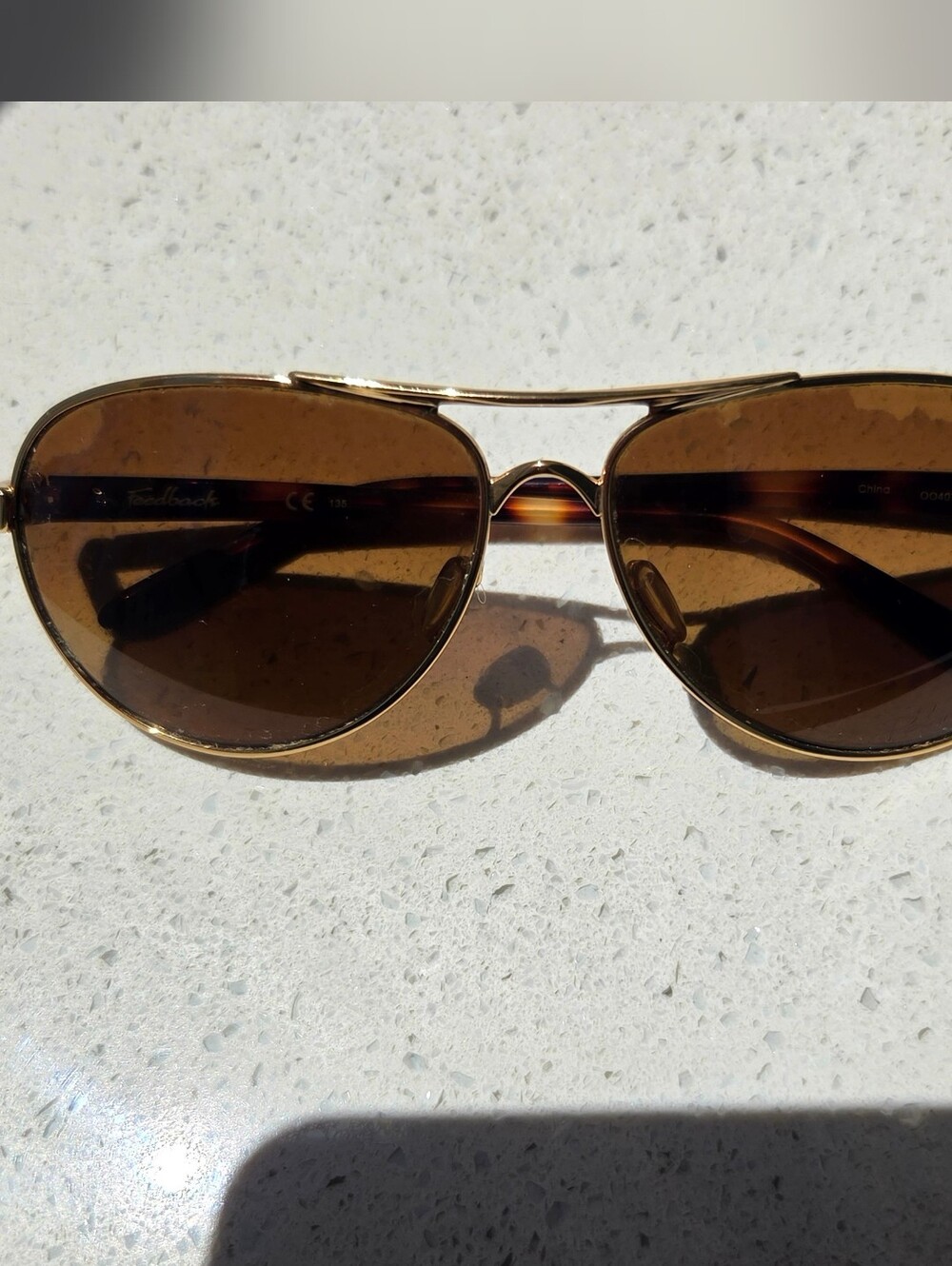 Oakley Feedback Aviator Sunglasses with Brown Lenses and Gold Frame